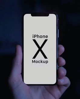 Free iPhone X In Male Hand Photo Mockup PSD