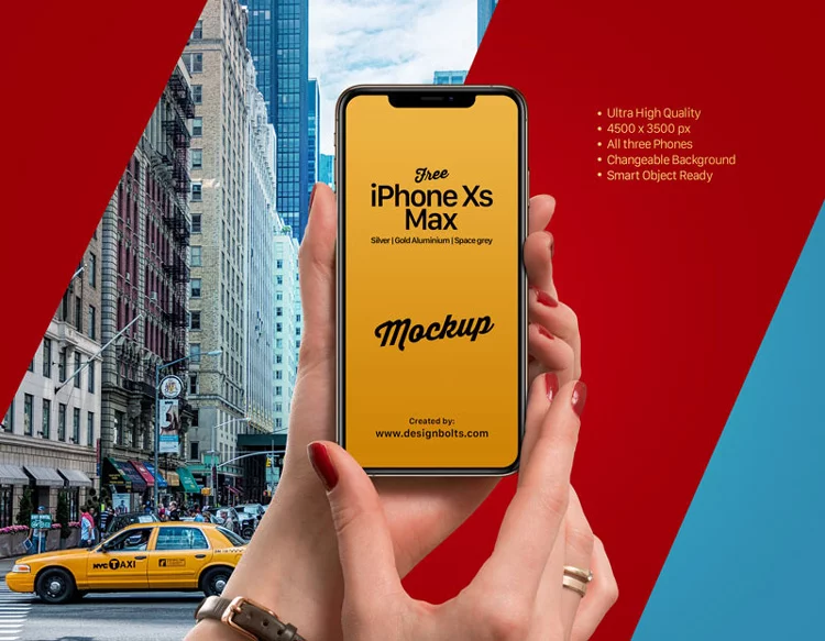 Free iPhone Xs Max in Female Hand Mockup PSD